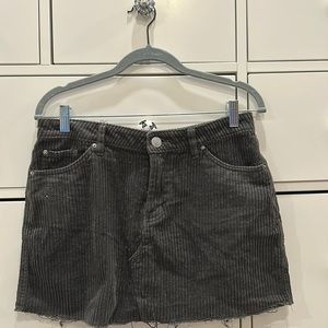 BDG mini skirt in dark green corduroy size M